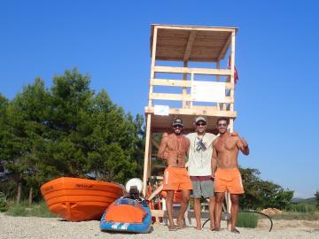 With lifeguards Lazarus and Ioannis at Kalavostasi beach, Greece